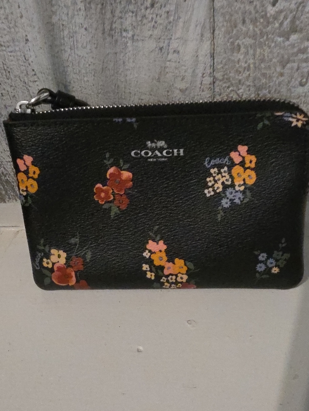 COACH Black Floral Zip Pouch - Women's Wristlet